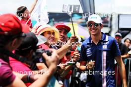 Esteban Ocon (FRA) Sahara Force India F1 Team with fans. 30.09.2017. Formula 1 World Championship, Rd 15, Malaysian Grand Prix, Sepang, Malaysia, Saturday.