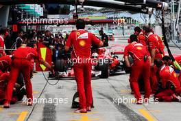 Sebastian Vettel (GER) Ferrari SF70H practices a pit stop. 30.09.2017. Formula 1 World Championship, Rd 15, Malaysian Grand Prix, Sepang, Malaysia, Saturday.