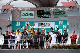 The drivers on the podium say thank you to Malaysia and its Grand Prix. 01.10.2017. Formula 1 World Championship, Rd 15, Malaysian Grand Prix, Sepang, Malaysia, Sunday.