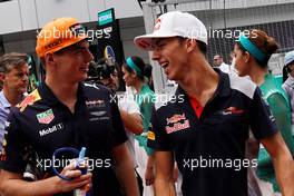 (L to R): Max Verstappen (NLD) Red Bull Racing with Pierre Gasly (FRA) Scuderia Toro Rosso on the drivers parade.                                01.10.2017. Formula 1 World Championship, Rd 15, Malaysian Grand Prix, Sepang, Malaysia, Sunday.
