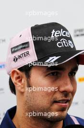 Sergio Perez (MEX) Sahara Force India F1 shows support for the victims of the Mexico earthquake. 28.09.2017. Formula 1 World Championship, Rd 15, Malaysian Grand Prix, Sepang, Malaysia, Thursday.