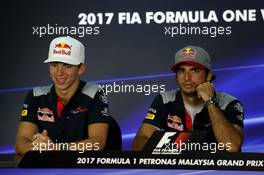 (L to R): Pierre Gasly (FRA) Scuderia Toro Rosso and team mate Carlos Sainz Jr (ESP) Scuderia Toro Rosso in the FIA Press Conference. 28.09.2017. Formula 1 World Championship, Rd 15, Malaysian Grand Prix, Sepang, Malaysia, Thursday.