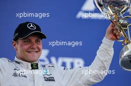 Race winner Valtteri Bottas (FIN) Mercedes AMG F1 celebrates on the podium. 30.04.2017. Formula 1 World Championship, Rd 4, Russian Grand Prix, Sochi Autodrom, Sochi, Russia, Race Day.