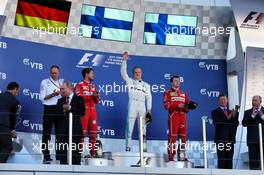 The podium (L to R): Sebastian Vettel (GER) Ferrari, second; Valtteri Bottas (FIN) Mercedes AMG F1, race winner; Kimi Raikkonen (FIN) Ferrari, third. 30.04.2017. Formula 1 World Championship, Rd 4, Russian Grand Prix, Sochi Autodrom, Sochi, Russia, Race Day.