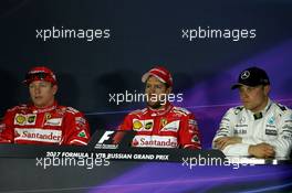 (L to R): Kimi Raikkonen (FIN) Ferrari with Sebastian Vettel (GER) Ferrari and Valtteri Bottas (FIN) Mercedes AMG F1 in the FIA Press Conference. 29.04.2017. Formula 1 World Championship, Rd 4, Russian Grand Prix, Sochi Autodrom, Sochi, Russia, Qualifying Day.