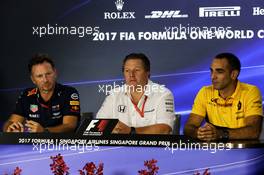 (L to R): Christian Horner (GBR) Red Bull Racing Team Principal with Zak Brown (USA) McLaren Executive Director and Cyril Abiteboul (FRA) Renault Sport F1 Managing Director in the FIA Press Conference. 15.09.2017. Formula 1 World Championship, Rd 14, Singapore Grand Prix, Marina Bay Street Circuit, Singapore, Practice Day.