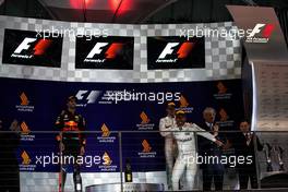 Race winner Lewis Hamilton (GBR) Mercedes AMG F1 celebrates on the podium.                                17.09.2017. Formula 1 World Championship, Rd 14, Singapore Grand Prix, Marina Bay Street Circuit, Singapore, Race Day.