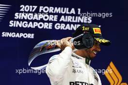 Race winner Lewis Hamilton (GBR) Mercedes AMG F1 celebrates on the podium. 17.09.2017. Formula 1 World Championship, Rd 14, Singapore Grand Prix, Marina Bay Street Circuit, Singapore, Race Day.