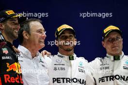 The podium (L to R): Daniel Ricciardo (AUS) Red Bull Racing, second; Lewis Hamilton (GBR) Mercedes AMG F1, race winner; Valtteri Bottas (FIN) Mercedes AMG F1, third. 17.09.2017. Formula 1 World Championship, Rd 14, Singapore Grand Prix, Marina Bay Street Circuit, Singapore, Race Day.