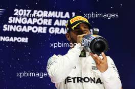 Race winner Lewis Hamilton (GBR) Mercedes AMG F1 celebrates on the podium. 17.09.2017. Formula 1 World Championship, Rd 14, Singapore Grand Prix, Marina Bay Street Circuit, Singapore, Race Day.