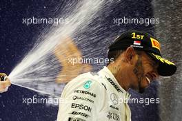 Race winner Lewis Hamilton (GBR) Mercedes AMG F1 celebrates on the podium. 17.09.2017. Formula 1 World Championship, Rd 14, Singapore Grand Prix, Marina Bay Street Circuit, Singapore, Race Day.