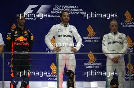 1st place Lewis Hamilton (GBR) Mercedes AMG F1 W08, 2nd for Daniel Ricciardo (AUS) Red Bull Racing RB13 and 3rd for Valtteri Bottas (FIN) Mercedes AMG F1. 17.09.2017. Formula 1 World Championship, Rd 14, Singapore Grand Prix, Marina Bay Street Circuit, Singapore, Race Day.