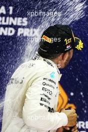 Race winner Lewis Hamilton (GBR) Mercedes AMG F1 celebrates on the podium. 17.09.2017. Formula 1 World Championship, Rd 14, Singapore Grand Prix, Marina Bay Street Circuit, Singapore, Race Day.