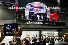 The podium (L to R): Daniel Ricciardo (AUS) Red Bull Racing, second; Lewis Hamilton (GBR) Mercedes AMG F1, race winner; Valtteri Bottas (FIN) Mercedes AMG F1, third. 17.09.2017. Formula 1 World Championship, Rd 14, Singapore Grand Prix, Marina Bay Street Circuit, Singapore, Race Day.