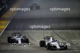 Lance Stroll (CDN) Williams FW40 and team mate Felipe Massa (BRA) Williams FW40. 17.09.2017. Formula 1 World Championship, Rd 14, Singapore Grand Prix, Marina Bay Street Circuit, Singapore, Race Day.