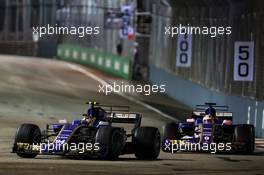 Pascal Wehrlein (GER) Sauber C36 leads team mate Marcus Ericsson (SWE) Sauber C36. 17.09.2017. Formula 1 World Championship, Rd 14, Singapore Grand Prix, Marina Bay Street Circuit, Singapore, Race Day.