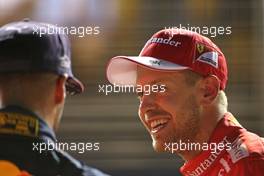 Max Verstappen (NLD) Red Bull Racing and Sebastian Vettel (GER) Scuderia Ferrari  16.09.2017. Formula 1 World Championship, Rd 14, Singapore Grand Prix, Marina Bay Street Circuit, Singapore, Qualifying Day.