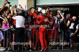 Sebastian Vettel (GER) Ferrari celebrates his third position with the team in parc ferme. 26.11.2017. Formula 1 World Championship, Rd 20, Abu Dhabi Grand Prix, Yas Marina Circuit, Abu Dhabi, Race Day.