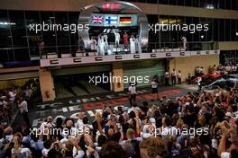 The podium (L to R): Lewis Hamilton (GBR) Mercedes AMG F1, second; Valtteri Bottas (FIN) Mercedes AMG F1, race winner; Sebastian Vettel (GER) Ferrari, third.                                26.11.2017. Formula 1 World Championship, Rd 20, Abu Dhabi Grand Prix, Yas Marina Circuit, Abu Dhabi, Race Day.