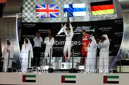 The podium (L to R): Lewis Hamilton (GBR) Mercedes AMG F1, second; Valtteri Bottas (FIN) Mercedes AMG F1, race winner; Sebastian Vettel (GER) Ferrari, third. 26.11.2017. Formula 1 World Championship, Rd 20, Abu Dhabi Grand Prix, Yas Marina Circuit, Abu Dhabi, Race Day.