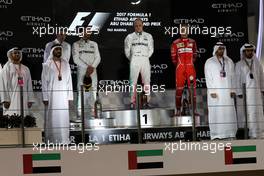 The podium (L to R): Lewis Hamilton (GBR) Mercedes AMG F1, second; Valtteri Bottas (FIN) Mercedes AMG F1, race winner; Sebastian Vettel (GER) Ferrari, third. 26.11.2017. Formula 1 World Championship, Rd 20, Abu Dhabi Grand Prix, Yas Marina Circuit, Abu Dhabi, Race Day.