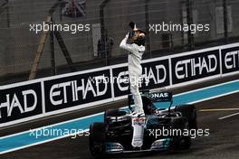 Lewis Hamilton (GBR) Mercedes AMG F1 W08 celebrates his second position in parc ferme. 26.11.2017. Formula 1 World Championship, Rd 20, Abu Dhabi Grand Prix, Yas Marina Circuit, Abu Dhabi, Race Day.