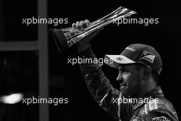 Sebastian Vettel (GER) Ferrari celebrates his third position on the podium. 26.11.2017. Formula 1 World Championship, Rd 20, Abu Dhabi Grand Prix, Yas Marina Circuit, Abu Dhabi, Race Day.