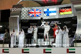 The podium (L to R): Lewis Hamilton (GBR) Mercedes AMG F1, second; Valtteri Bottas (FIN) Mercedes AMG F1, race winner; Sebastian Vettel (GER) Ferrari, third. 26.11.2017. Formula 1 World Championship, Rd 20, Abu Dhabi Grand Prix, Yas Marina Circuit, Abu Dhabi, Race Day.