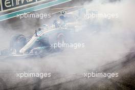 Race winner Valtteri Bottas (FIN) Mercedes AMG F1 W08 celebrates at the end of the race with some doughnuts. 26.11.2017. Formula 1 World Championship, Rd 20, Abu Dhabi Grand Prix, Yas Marina Circuit, Abu Dhabi, Race Day.