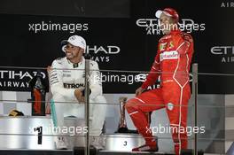 Lewis Hamilton (GBR) Mercedes AMG F1, second and Sebastian Vettel (GER) Ferrari, third. 26.11.2017. Formula 1 World Championship, Rd 20, Abu Dhabi Grand Prix, Yas Marina Circuit, Abu Dhabi, Race Day.