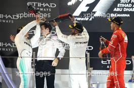 Lewis Hamilton (GBR) Mercedes AMG F1, second; Valtteri Bottas (FIN) Mercedes AMG F1, race winner; Sebastian Vettel (GER) Ferrari, third. 26.11.2017. Formula 1 World Championship, Rd 20, Abu Dhabi Grand Prix, Yas Marina Circuit, Abu Dhabi, Race Day.