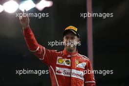 3rd place Sebastian Vettel (GER) Ferrari SF70H. 26.11.2017. Formula 1 World Championship, Rd 20, Abu Dhabi Grand Prix, Yas Marina Circuit, Abu Dhabi, Race Day.