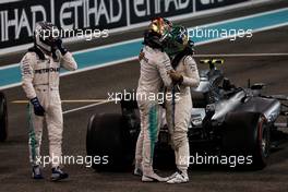 (L to R): Race winner Valtteri Bottas (FIN) Mercedes AMG F1 in parc ferme with Lewis Hamilton (GBR) Mercedes AMG F1 and Felipe Massa (BRA) Williams. 26.11.2017. Formula 1 World Championship, Rd 20, Abu Dhabi Grand Prix, Yas Marina Circuit, Abu Dhabi, Race Day.