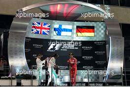 The podium (L to R): race winner Valtteri Bottas (FIN) Mercedes AMG F1; Lewis Hamilton (GBR) Mercedes AMG F1; Sebastian Vettel (GER) Ferrari. 26.11.2017. Formula 1 World Championship, Rd 20, Abu Dhabi Grand Prix, Yas Marina Circuit, Abu Dhabi, Race Day.