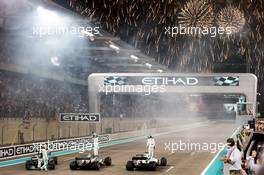 (L to R): Lewis Hamilton (GBR) Mercedes AMG F1 W08 at the end of the race with race winner Valtteri Bottas (FIN) Mercedes AMG F1 W08 and Felipe Massa (BRA) Williams FW40. 26.11.2017. Formula 1 World Championship, Rd 20, Abu Dhabi Grand Prix, Yas Marina Circuit, Abu Dhabi, Race Day.