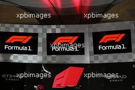 The new F1 logo on the podium. 26.11.2017. Formula 1 World Championship, Rd 20, Abu Dhabi Grand Prix, Yas Marina Circuit, Abu Dhabi, Race Day.