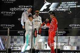 The podium (L to R): Race winner Valtteri Bottas (FIN) Mercedes AMG F1 with second placed Lewis Hamilton (GBR) Mercedes AMG F1 and third placed Sebastian Vettel (GER) Ferrari. 26.11.2017. Formula 1 World Championship, Rd 20, Abu Dhabi Grand Prix, Yas Marina Circuit, Abu Dhabi, Race Day.