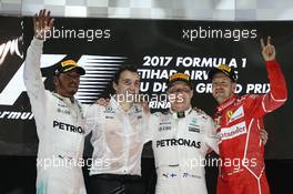 The podium - (L to R): Lewis Hamilton (GBR) Mercedes AMG F1, second; Valtteri Bottas (FIN) Mercedes AMG F1, race winner; Sebastian Vettel (GER) Ferrari, third. 26.11.2017. Formula 1 World Championship, Rd 20, Abu Dhabi Grand Prix, Yas Marina Circuit, Abu Dhabi, Race Day.