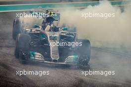 Race winner Valtteri Bottas (FIN) Mercedes AMG F1 W08 celebrates at the end of the race with some doughnuts. 26.11.2017. Formula 1 World Championship, Rd 20, Abu Dhabi Grand Prix, Yas Marina Circuit, Abu Dhabi, Race Day.