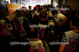 Photographers gather for the podium.                                26.11.2017. Formula 1 World Championship, Rd 20, Abu Dhabi Grand Prix, Yas Marina Circuit, Abu Dhabi, Race Day.