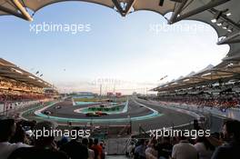 Carlos Sainz Jr (ESP) Renault Sport F1 Team RS17 and Max Verstappen (NLD) Red Bull Racing RB13. 26.11.2017. Formula 1 World Championship, Rd 20, Abu Dhabi Grand Prix, Yas Marina Circuit, Abu Dhabi, Race Day.