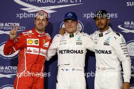 pole for Valtteri Bottas (FIN) Mercedes AMG F1 W08, 2nd for Lewis Hamilton (GBR) Mercedes AMG F1 W08 and 3rd for Sebastian Vettel (GER) Ferrari SF70H. 25.11.2017. Formula 1 World Championship, Rd 20, Abu Dhabi Grand Prix, Yas Marina Circuit, Abu Dhabi, Qualifying Day.