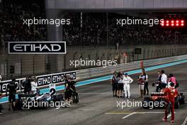 (L to R): Lewis Hamilton (GBR) Mercedes AMG F1 W08; Valtteri Bottas (FIN) Mercedes AMG F1; Sebastian Vettel (GER) Ferrari SF70H, in qualifying parc ferme. 25.11.2017. Formula 1 World Championship, Rd 20, Abu Dhabi Grand Prix, Yas Marina Circuit, Abu Dhabi, Qualifying Day.