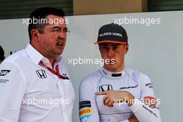 (L to R): Eric Boullier (FRA) McLaren Racing Director with Stoffel Vandoorne (BEL) McLaren.