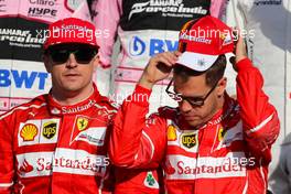 Kimi Raikkonen (FIN) Scuderia Ferrari and Sebastian Vettel (GER) Scuderia Ferrari  26.11.2017. Formula 1 World Championship, Rd 20, Abu Dhabi Grand Prix, Yas Marina Circuit, Abu Dhabi, Race Day.