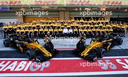 (L to R): Carlos Sainz Jr (ESP) Renault Sport F1 Team and Nico Hulkenberg (GER) Renault Sport F1 Team at a team photograph. 26.11.2017. Formula 1 World Championship, Rd 20, Abu Dhabi Grand Prix, Yas Marina Circuit, Abu Dhabi, Race Day.