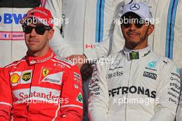 Sebastian Vettel (GER) Scuderia Ferrari and Lewis Hamilton (GBR) Mercedes AMG F1   26.11.2017. Formula 1 World Championship, Rd 20, Abu Dhabi Grand Prix, Yas Marina Circuit, Abu Dhabi, Race Day.