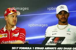 (L to R): Sebastian Vettel (GER) Ferrari and Lewis Hamilton (GBR) Mercedes AMG F1 in the FIA Press Conference. 23.11.2017. Formula 1 World Championship, Rd 20, Abu Dhabi Grand Prix, Yas Marina Circuit, Abu Dhabi, Preparation Day.