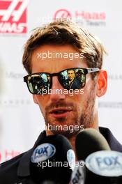Romain Grosjean (FRA) Haas F1 Team with the media. 23.11.2017. Formula 1 World Championship, Rd 20, Abu Dhabi Grand Prix, Yas Marina Circuit, Abu Dhabi, Preparation Day.