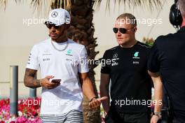 (L to R): Lewis Hamilton (GBR) Mercedes AMG F1 with team mate Valtteri Bottas (FIN) Mercedes AMG F1. 23.11.2017. Formula 1 World Championship, Rd 20, Abu Dhabi Grand Prix, Yas Marina Circuit, Abu Dhabi, Preparation Day.